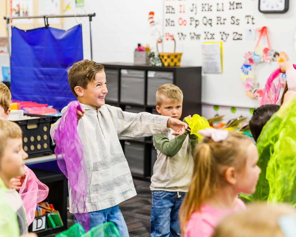 Second-grader dances the plant life cycle and uses the arts to learn core content.