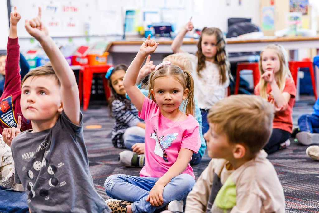 Using movement to show the parts of the flower, second-grade students dance the plant life cycle.